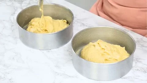 Incorporating Milk and Remaining Dry Ingredients & Filling the Cake Tins